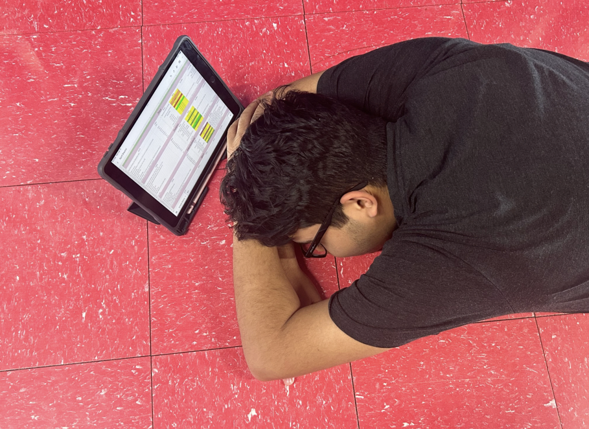 Darsh takes a nap (on the floor) after editing for hours. He is not allowed a bed.